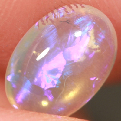 SOLID CRYSTAL OPAL Transparent with rich purple within